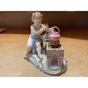 Polychrome Meissen Porcelain Representing A Putti Preparing His Chocolate.