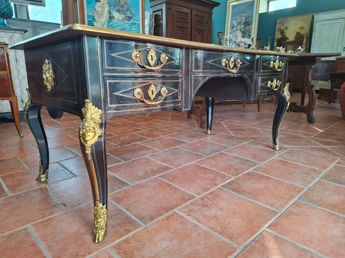 Grande scrivania Napoleone III ebanizzata e dorata