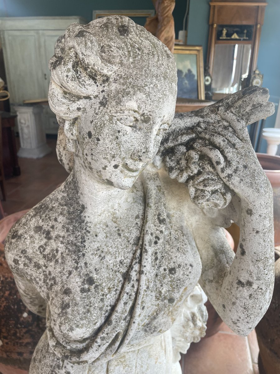 Scultura allegorica da giardino raffigurante una fanciulla con fiori-photo-4