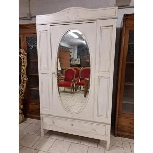Armadio dipinto con specchio ovale molato