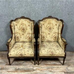 Large Pair Of Louis XVI Style Bergère Armchairs In Carved Wood