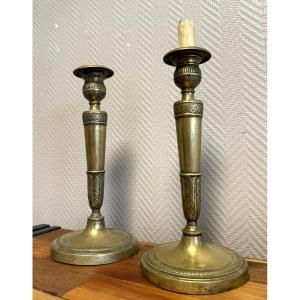 Pair Of Empire Period Candlesticks In Gilt Bronze