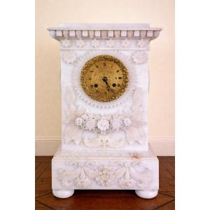 Alabaster Mantel Clock, Featuring A Richly Sculpted Facade With Floral Motifs.