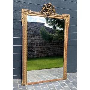 Large Louis XVI Style Mirror With Cherubs In Wood And Gilded Stucco 