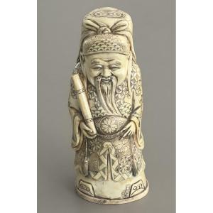 Carved Ivory Okimono Representing A Chinese Bearded Sage