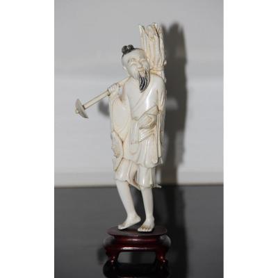 Okimono In Ivory Representing An Old Fisherman