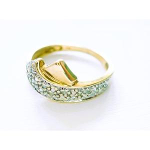 18-carat Gold Ribbon Ring Set With Diamonds
