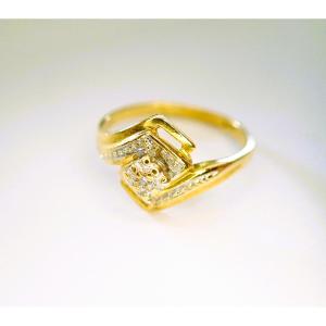 Two-tone Ring In 18-karat Gold With A Small Diamond In The Center
