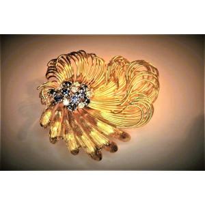 Diamond And Sapphire Brooch In 18-carat Gold