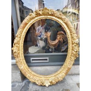 Important Oval Frame In Carved And Gilded Louis XIV Wood.