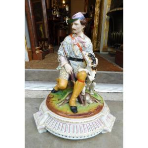 Polychrome Biscuit Group Representing A Seated Hunter, 19th Century