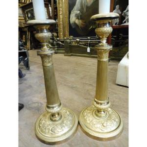 Pair Of Chased And Gilded Bronze Candlesticks Circa 1820.
