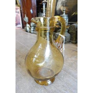 19th Century Amber Glass Pitcher With A Flattened Body 