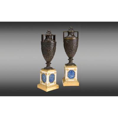 Patinated Bronze Urns Mounted On White Marble, Lapis Lazuli And Gilded Bronze Bases