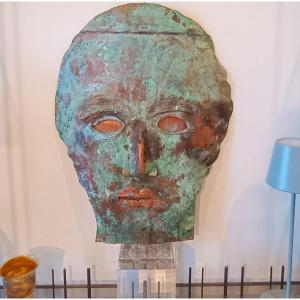 Scultura  maschera del '900 in rame ossidato 
