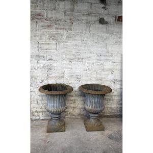 Pair Of Cast Iron Medici Vases. 