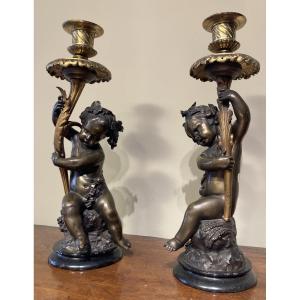 Pair Of Bronze Cherub Candlesticks