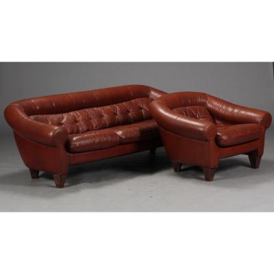 Fawn Leather Lounge Including A Sofa And Three Armchairs.