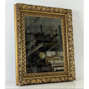 Mirror Dating From Around 1890-1900 With A Richly Decorated Frame Featuring Figs And Leaves