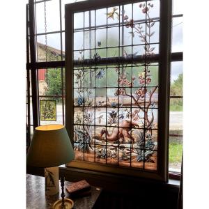 Stained Glass Windows Decorated With Birds, Insects, Foliage And Flowers