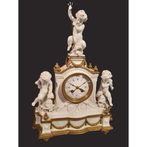 Sevres,antico orologio in biscuit e bronzo dorato