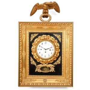 Antico orologio a pendolo Impero da parete in legno dorato 