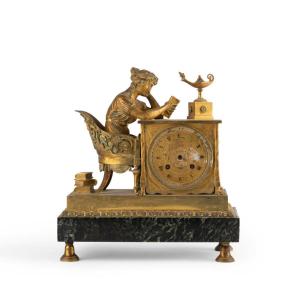 D'après Jean André Reiche (1752-1817), La liseuse, pendule en bronze, XIXe