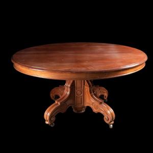 Table de salle à manger en acajou sur quatre pied-console en volute, XIXe