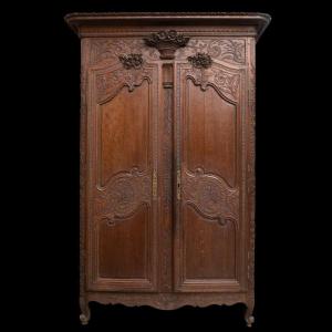 Armoire de mariage en ch&ecirc;ne sculpt&eacute;, Normandie, XIXe