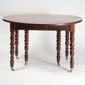Table &agrave; volets &agrave; six pieds en acajou, XIXe
