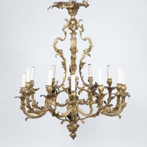 Lustre en bronze doré à décor d'angelots à patine brune, XIXe