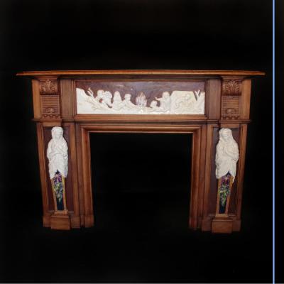 Cheminée en noyer sculpté, XIXe