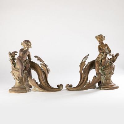 Paire de chenets aux petits Bacchus en bronze doré, XIXe