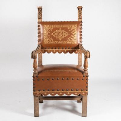 Fauteuil trône néo-renaissance en noyer et cuir doré, fin XIXe, début XXe