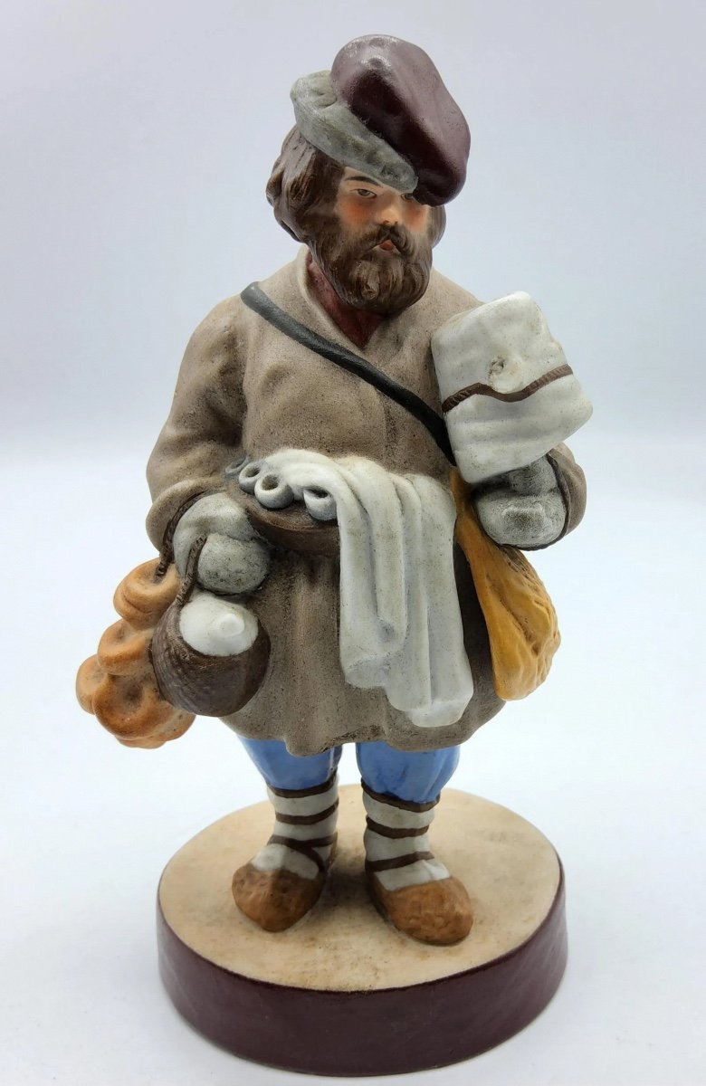 Statuetta russa Gardner della serie dei venditori ambulanti della lanterna magica, venditore 