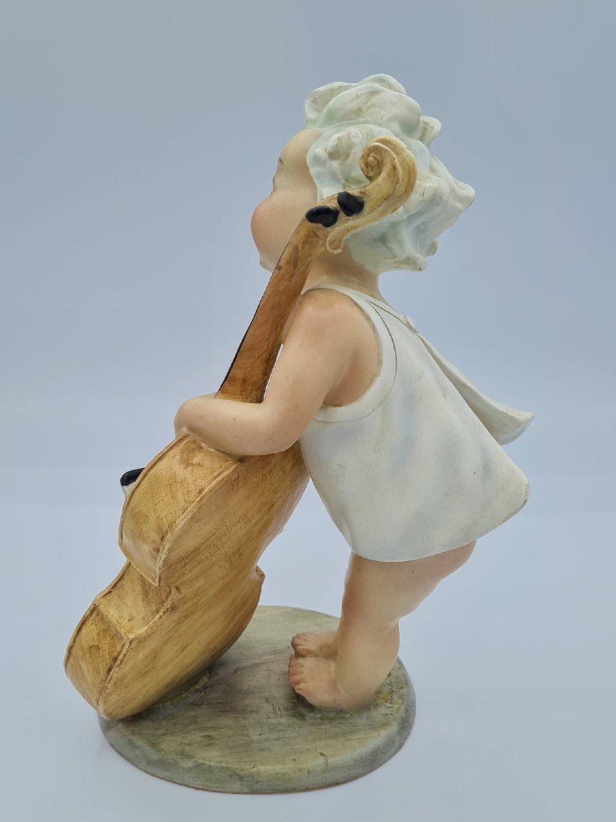 Arturo Pannunzio (1891-1953), Petite fille au violoncelle, figurine en céramique-photo-4