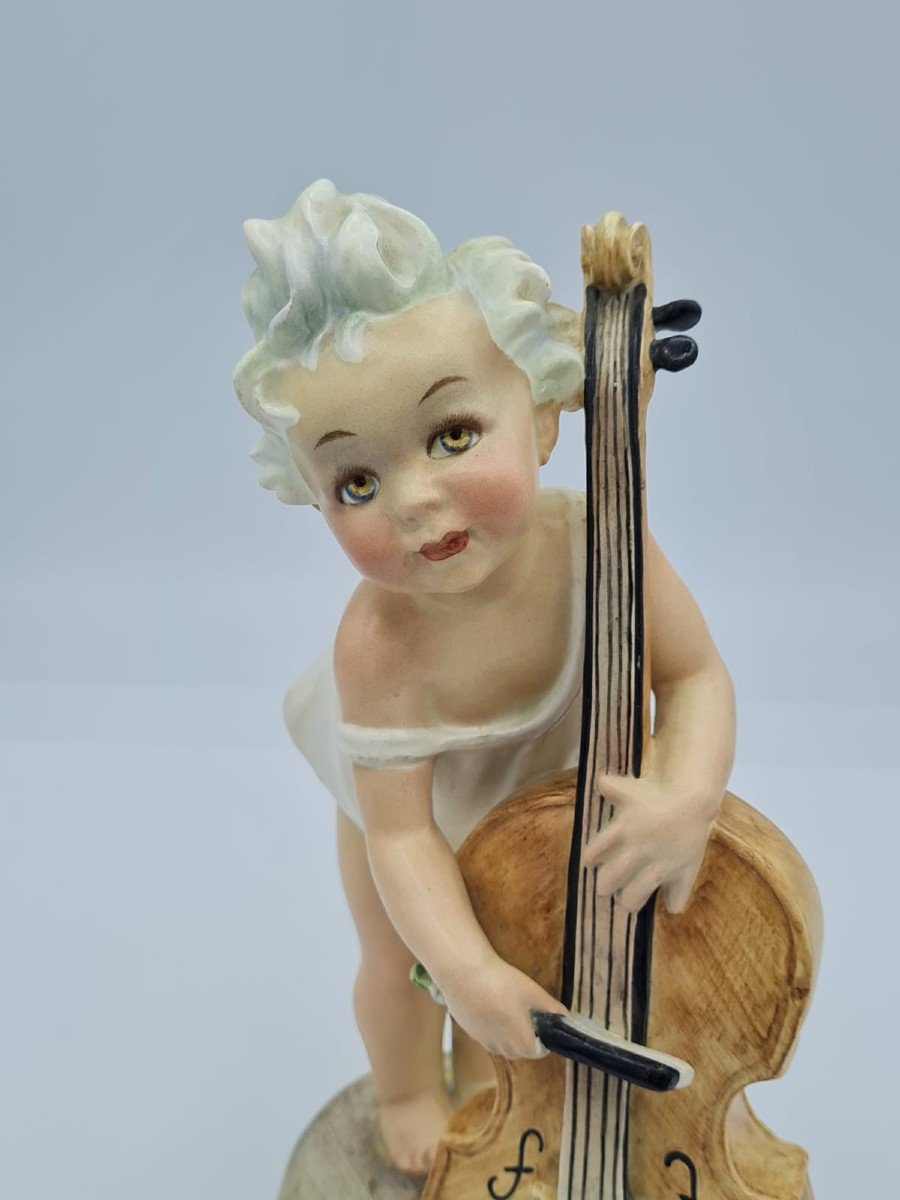 Arturo Pannunzio (1891-1953), Petite fille au violoncelle, figurine en céramique-photo-2