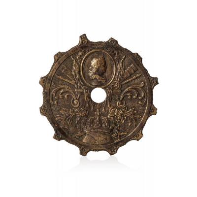 Centre Of A Patinated Bronze Dial With The Profile Of The Young King Louis XIV