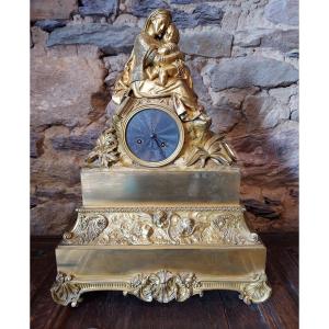 Pendulum In Gilt Bronze Representing The Virgin At The Chair By Raphael
