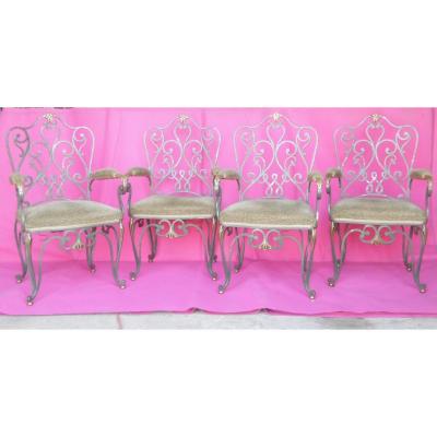 Four Wrought Iron Armchairs