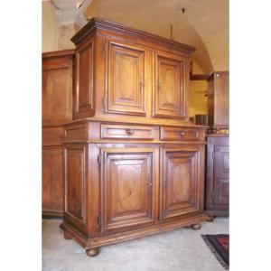 A Two Piece Sideboard From Burgondy