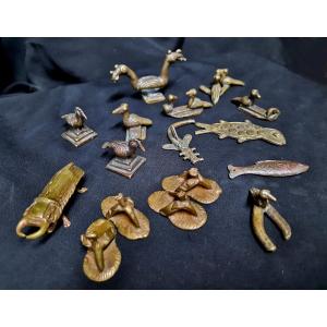 Collection Of Weights And Little Spoons To Weigh Gold