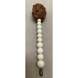 Baby Rattle In Bakelite And Pierced Walnut, France Circa 1930