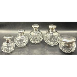 A Series Of Crystal And Sterling Silver Bottles And Boxes By Baccarat And Brionne From The 1930s