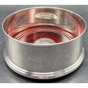 A Solid Silver And Mahogany Decanter Or Bottle Mat From The English 2000s