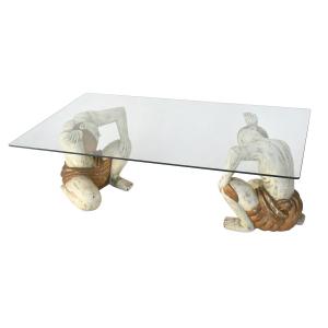 Coffee Table With Two Figures Holding A Glass Tray