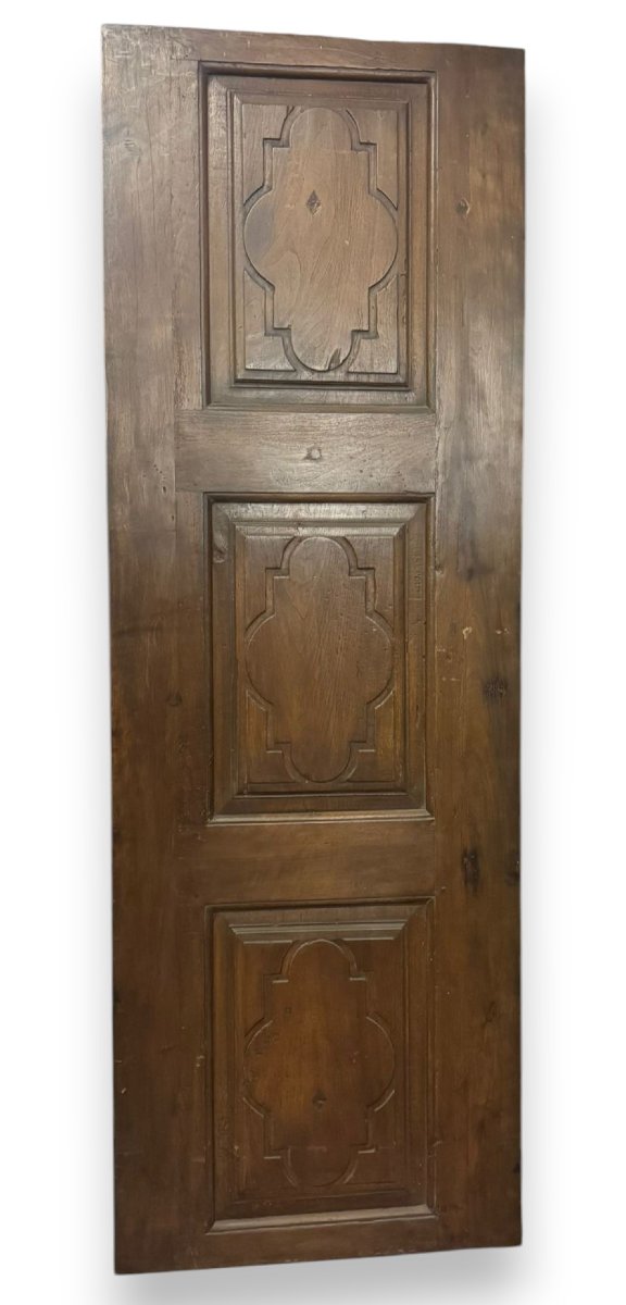 Porta a un battente, in legno di noce, epoca '700