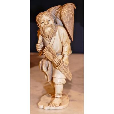 Okimono In Japanese Ivory Meiji Period Representative Aîno Carrying An Eagle