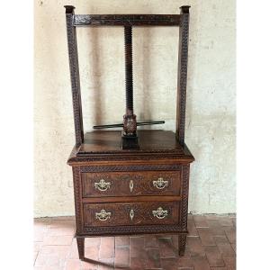 Early 19th Century Louis XVI Linen Press Chest Of Drawers With Carved Motifs