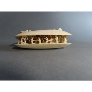 Ivory Okimono. Inhabited Shell. Canton, Early 20th Century.